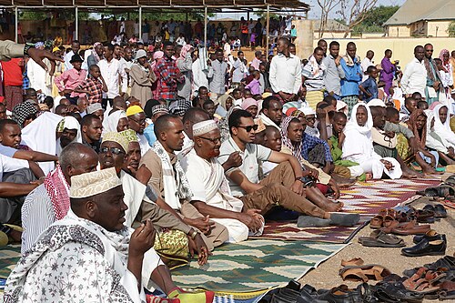 A large gathering of Muslims praying outdoors at Eid al-Fitr in Somalia